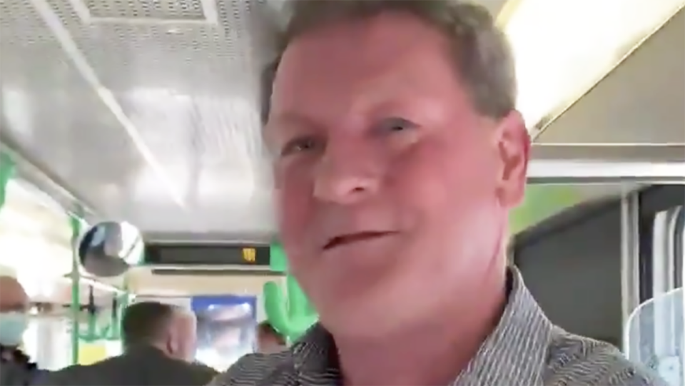 Former AFL player agent Ricky Nixon was filmed appearing to harass a female passenger on a Melbourne tram, who told him to 'go away' after telling him her son had tied two weeks earlier. Picture: Twitter