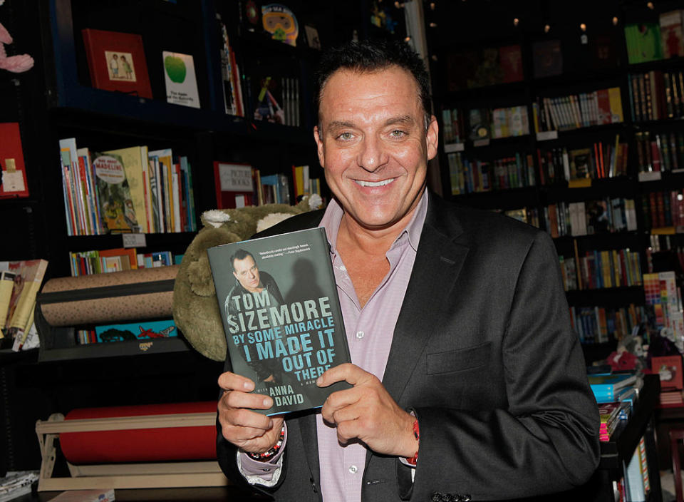 Tom Sizemore signs copies of his book, 