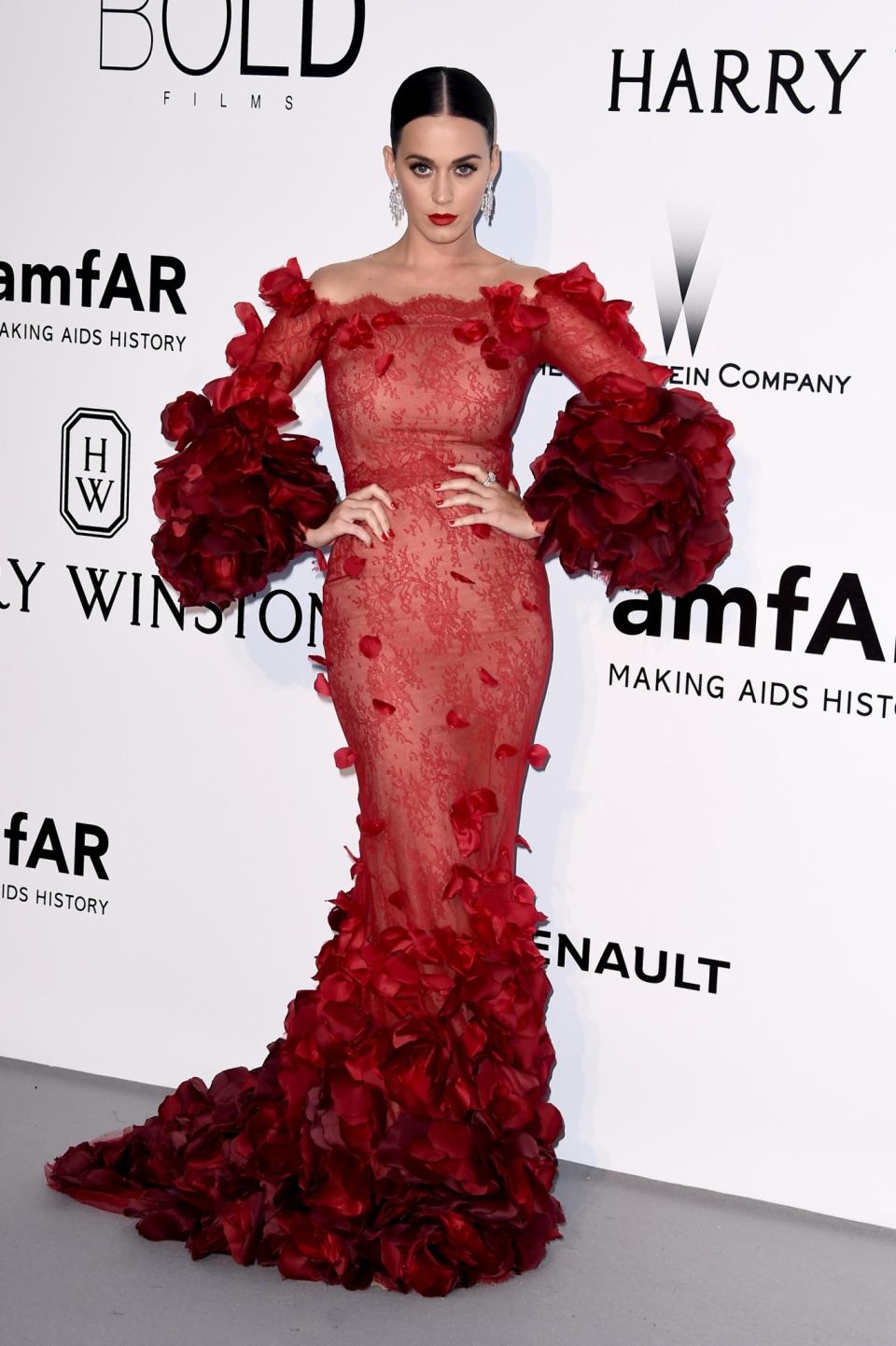 <p>This Marchesa red petal-embellished gown Katy wore to the amFAR Aids Gala is just downright dreamy. [Photo: Getty] </p>