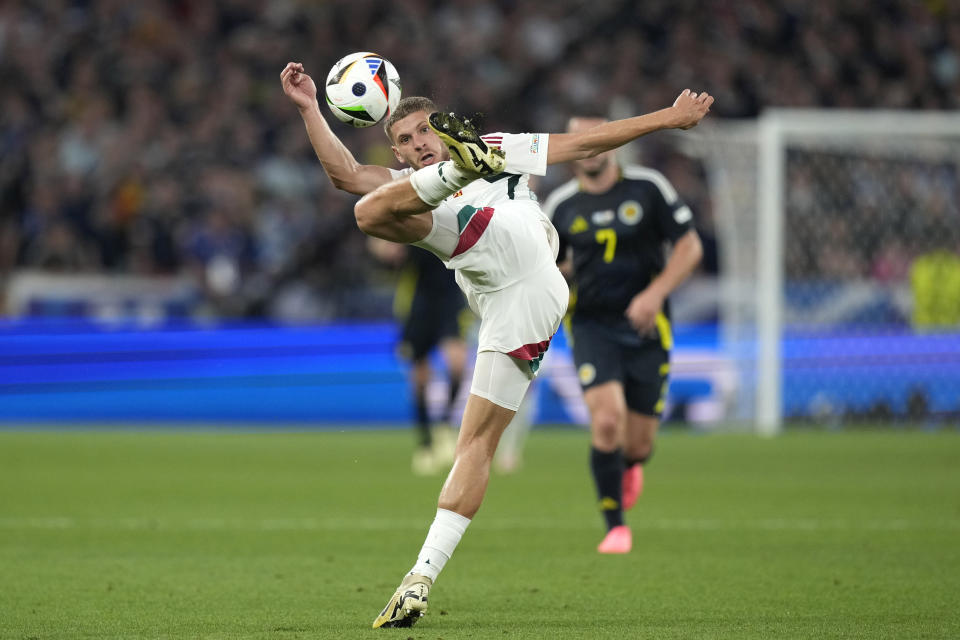 Hungary's Marton Dardai controls the ball during a Group A match between Scotland and Hungary at the Euro 2024 soccer tournament in Stuttgart, Germany, Sunday, June 23, 2024. (AP Photo/Antonio Calanni)