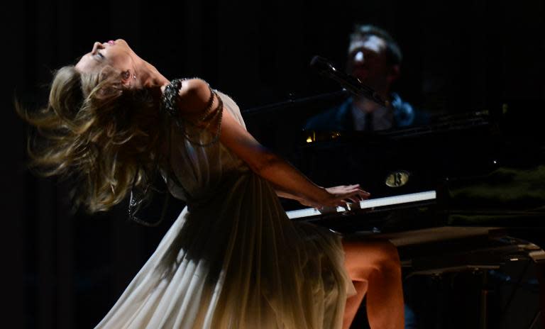 Taylor Swift performs on stage during the 56th Grammy Awards at the Staples Center in Los Angeles, California, January 26, 2014