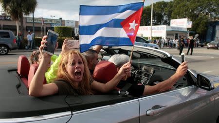 People celebrate after the announcement of the death of Cuban revolutionary leader Fidel Castro, in the Little Havana district of Miami, Florida, U.S. November 26, 2016. REUTERS/Javier Galeano