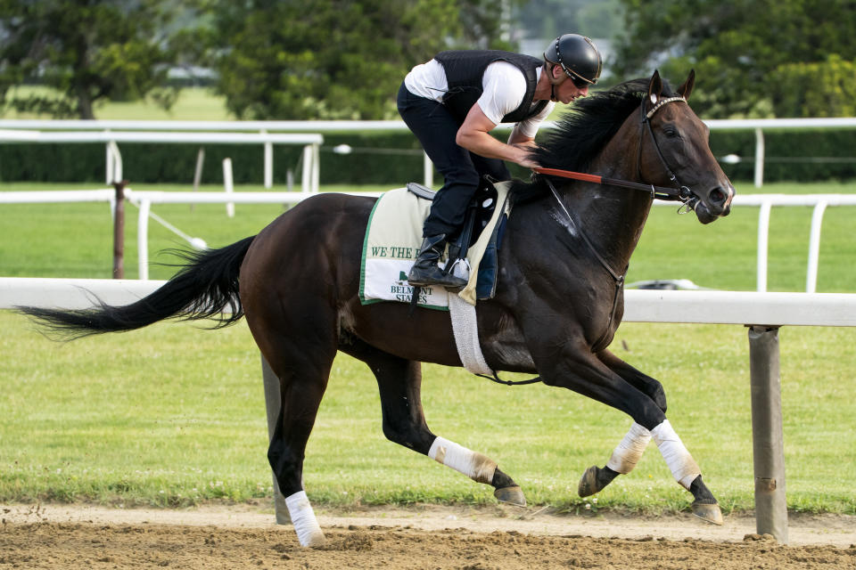 We the People, ridden by trainer Rodolphe Brisset, trains before the 154th running of the Belmont Stakes horse race, Wednesday, June 8, 2022, in Elmont, N.Y. Kentucky Derby winner Rich Strike is the third betting choice on the morning line for the Belmont Stakes, with Triple Crown newcomer We the People installed as the favorite. (AP Photo/John Minchillo)