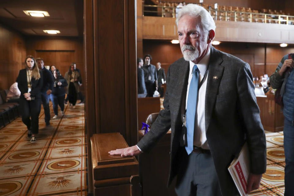 Republican state Sen. Dick Anderson walks out of Senate chambers following a Senate session where unexcused absences prevented a quorum for the third day, at the Oregon State Capitol in Salem, Ore., Friday, May 5, 2023. Four Republican senators and one Independent senator had unexcused absences. (AP Photo/Amanda Loman)