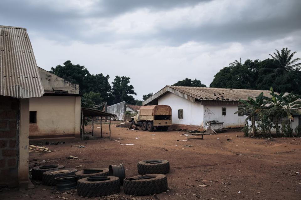 <div class="inline-image__caption"><p>A photograph taken on Feb. 3, 2021, shows a truck of the Russian private military group Wagner in the looted Central African Army (FACA) base of Bangassou, attacked on Jan. 3, 2021, by rebels.</p></div> <div class="inline-image__credit">Alexis Huguet/AFP via Getty</div>