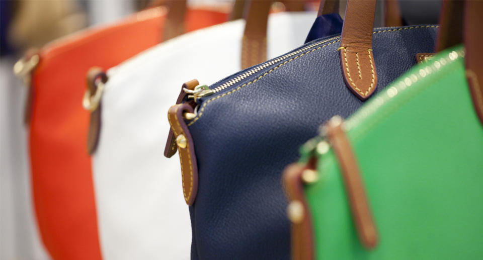 A man claiming to be an Italian fashion designer is scamming elderly Brisbane locals out of thousands, offering fake designer bags and clothes as a gift for the ‘loan’. Source: Getty, file