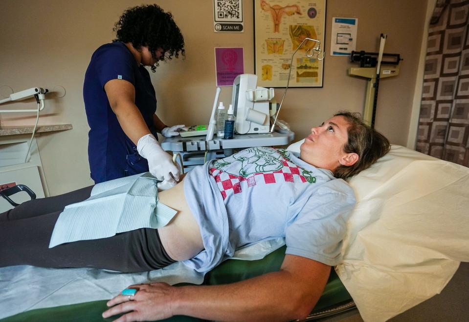 Lead medical assistant Gabriela Rodriguez performs an ultrasound on Alison Auwerda to look at her organs, tissue and other structures Monday at Austin Women's Health Center. Austin Women's Health Center, the last independent reproductive health care clinic in Central Texas, says its ability to keep providing care is in jeopardy.