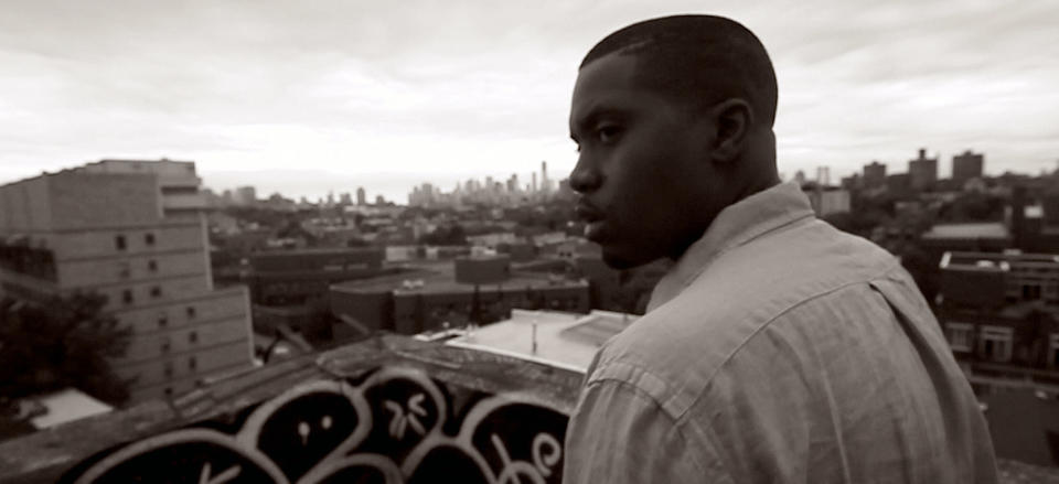 This image released by the Tribeca Film Festival shows Nas in a scene from the documentary, "Time is Illmatic." The film, which follows the trajectory of Nas’ 1994 landmark debut album, "Illmatic," will open the 2014 Tribeca Film Festival on April 16. The festival will run through April 27. (AP Photo/Tribeca Film Festival)