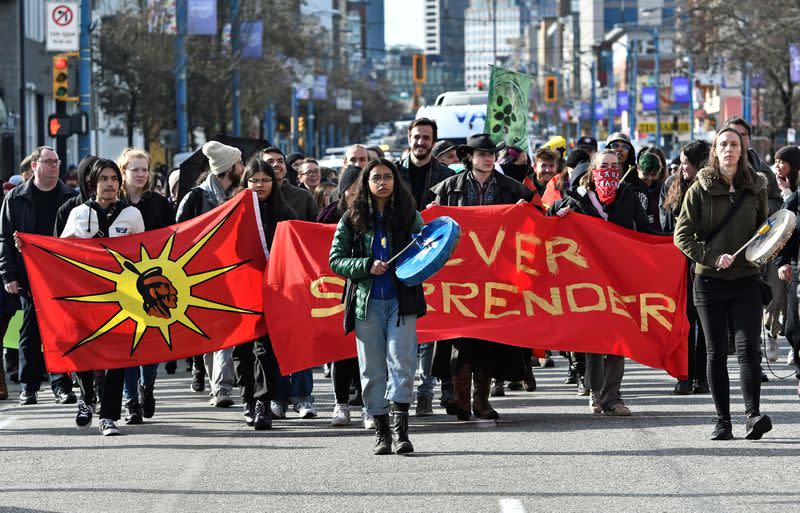 Supporters of the indigenous Wet'suwet'en Nation's hereditary chiefs march as part of protests against the Coastal GasLink pipeline