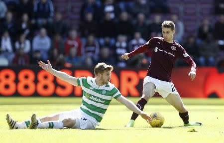 Britain Football Soccer - Heart of Midlothian v Celtic - Scottish Premiership - Tynecastle - 2/4/17 Heart's Andraz Struna in action with Celtic's Stuart Armstrong Reuters / Russell Cheyne Livepic