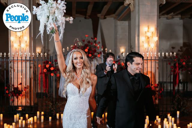 <p>DeAngelo Castro for SYMBOLL</p> Nita Strauss and Josh Villalta celebrate after tying the knot