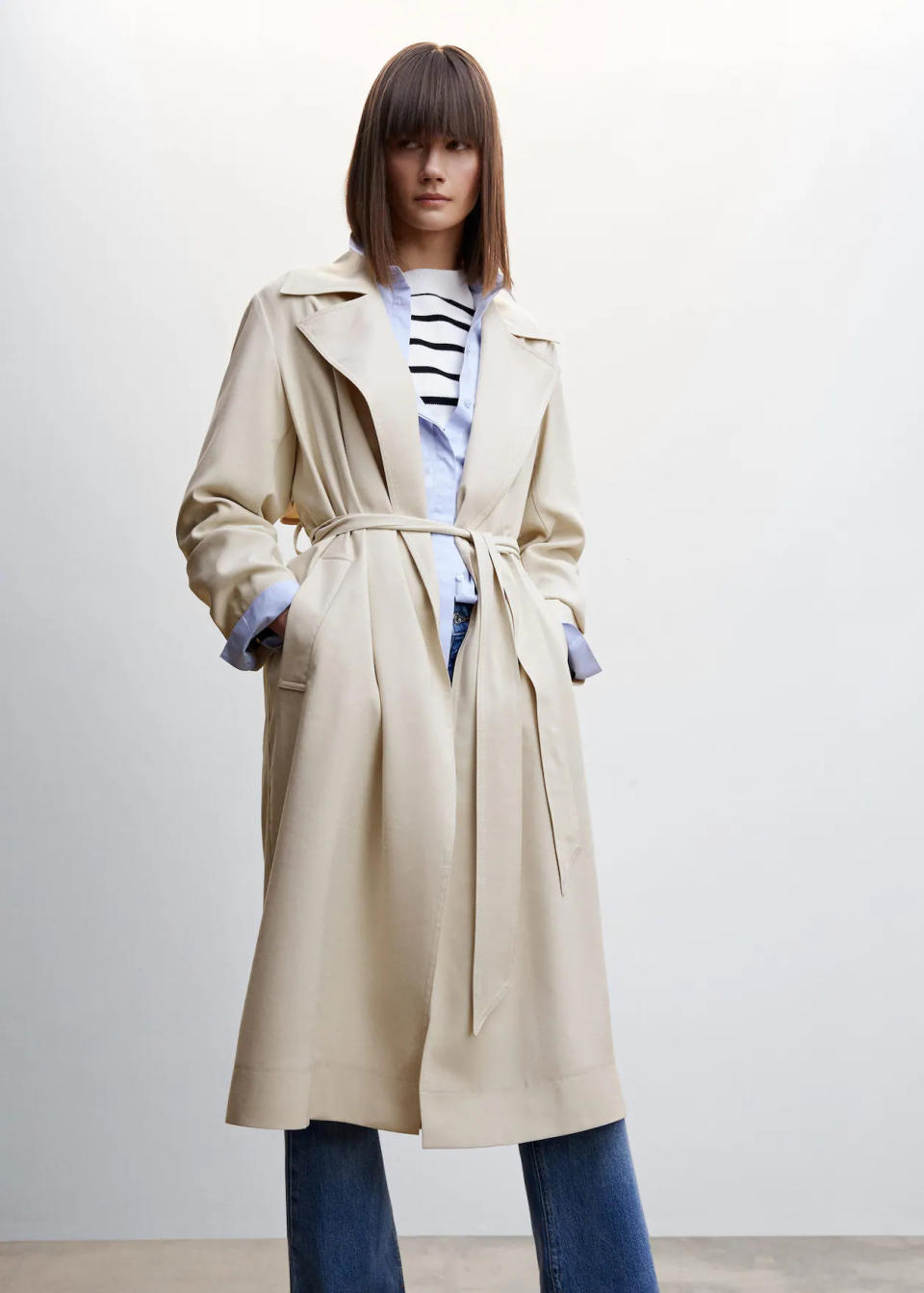 Flowy lapel trench. Image via Mango.