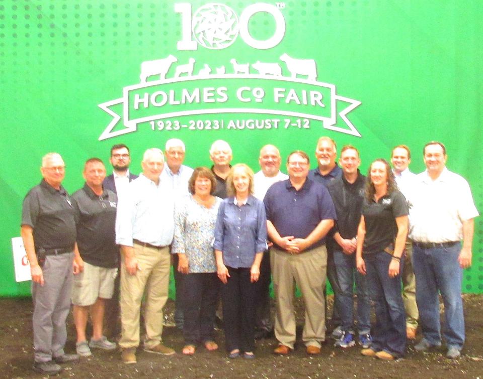Holmes County Fair Board President Kerry Taylor, front left, welcomed a number of federal, state and local elected officials to the 100th anniversary celebration Monday at the Holmes County Fair.