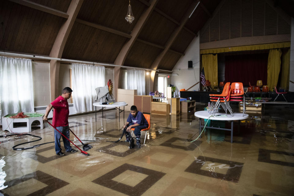 Parishioners pump out floodwater inside the Macedonia Baptist Church in Westville, N.J. Thursday, June 20, 2019. Severe storms containing heavy rains and strong winds spurred flooding across southern New Jersey, disrupting travel and damaging some property. (Photo: Matt Rourke)/AP