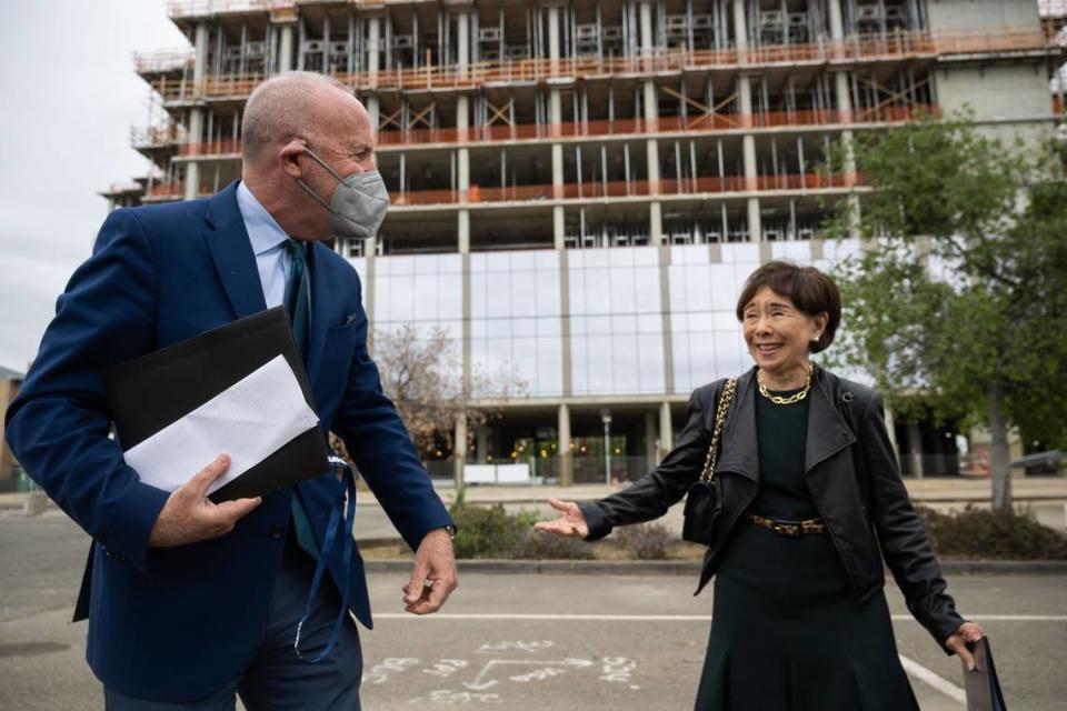 Sacramento Mayor Darrell Steinberg greets Rep. Doris Matsui, D-Sacramento, as they attend a ceremony to see the progress of Aggie Square innovation hub next to the UC Davis Health complex in Sacramento on Thursday, May 4, 2023.