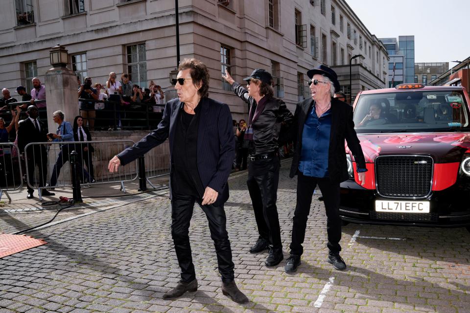 Ronnie Wood, from left, Mick Jagger, and Keith Richards arrive at the Rolling Stones "Hackney Diamonds" launch event on Wednesday, Sept. 6, 2023, in London.
