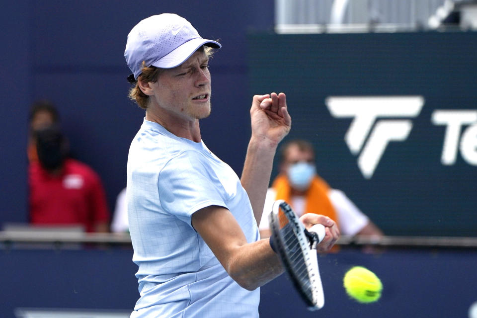 Jannik Sinner, of Italy, returns to Roberto Bautista Agut, of Spain, during the semifinals of the Miami Open tennis tournament, Friday, April 2, 2021, in Miami Gardens, Fla. (AP Photo/Lynne Sladky)