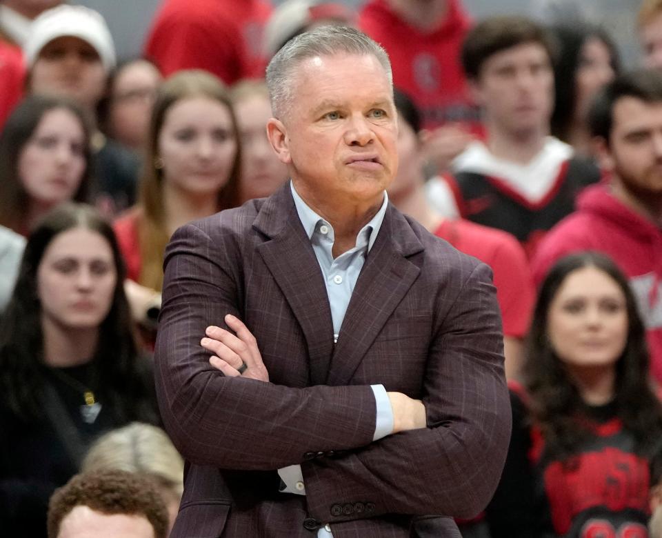 Ohio State parted ways with men's basketball coach Chris Holtmann the day after the Buckeyes lost 62-54 at No. 20 Wisconsin to drop to 14-11 overall and 4-10 in the Big Ten.