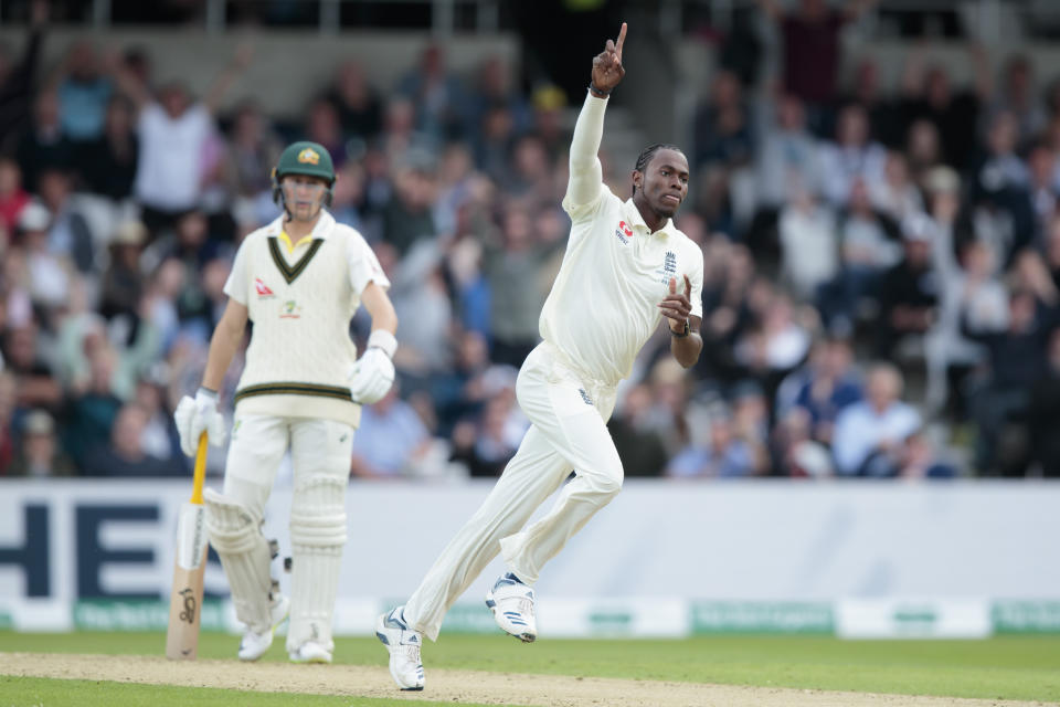 England's Jofra Archer celebrates after taking the wicket of Australia's David Warner caught by Jonny Bairstow for 61 on the first day of the 3rd Ashes Test cricket match between England and Australia at Headingley cricket ground in Leeds, England, Thursday, Aug. 22, 2019. (AP Photo/Jon Super)