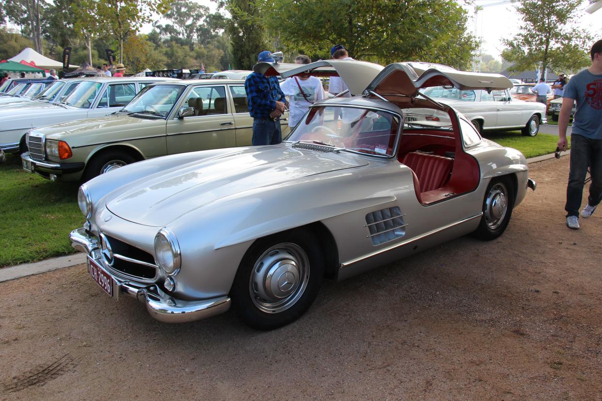 Silver 1956 Mercedes Benz 300 SL Gullwing with red leather interior