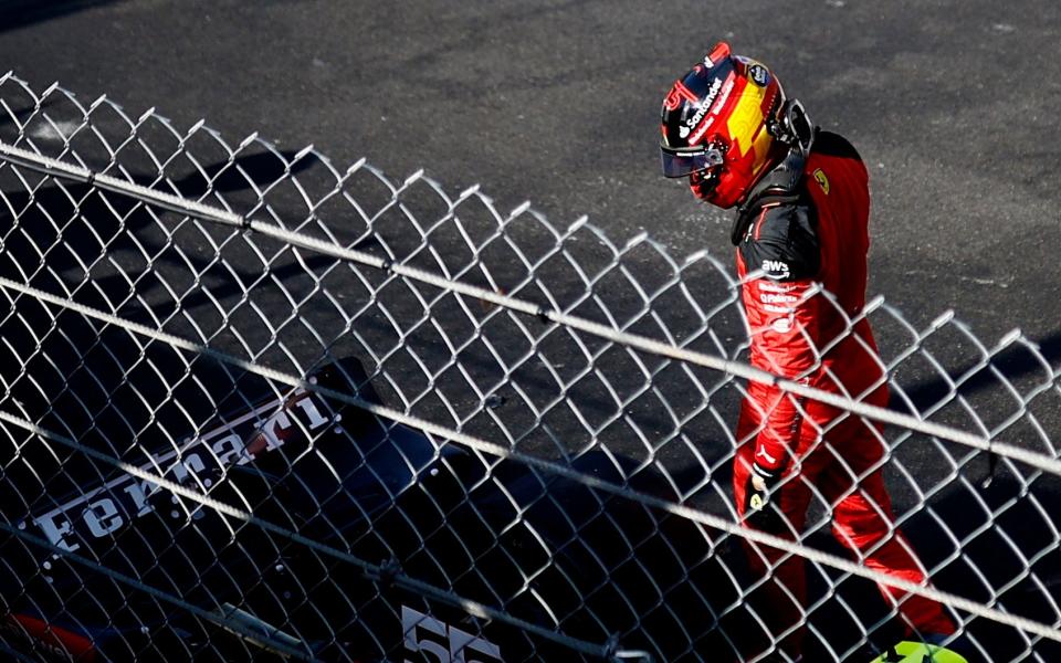 Ferrari's Carlos Sainz Jr. during practice walks on the race track during practice - Reuters/Stephane Mahe