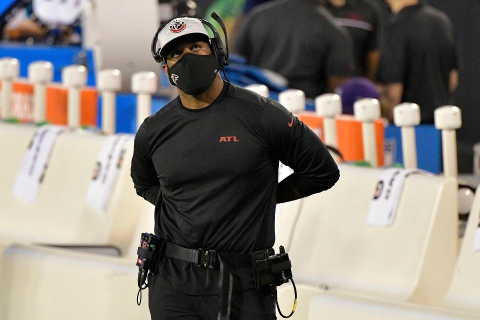 CHARLOTTE, NORTH CAROLINA - OCTOBER 29: head coach Raheem Morris of the Atlanta Falcons  looks on against the Carolina Panthers before the start of a game at Bank of America Stadium on October 29, 2020 in Charlotte, North Carolina. (Photo by Grant Halverson/Getty Images)