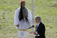 IOC President Thomas Bach delivers a speech before the lighting of the Olympic flame at Ancient Olympia site, birthplace of the ancient Olympics in southwestern Greece, Monday, Oct. 18, 2021. The flame will be transported by torch relay to Beijing, China, which will host the Feb. 4-20, 2022 Winter Olympics. (AP Photo/Petros Giannakouris)