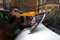 WikiLeaks' founder Julian Assange leaves Westminster Magistrates Court in London