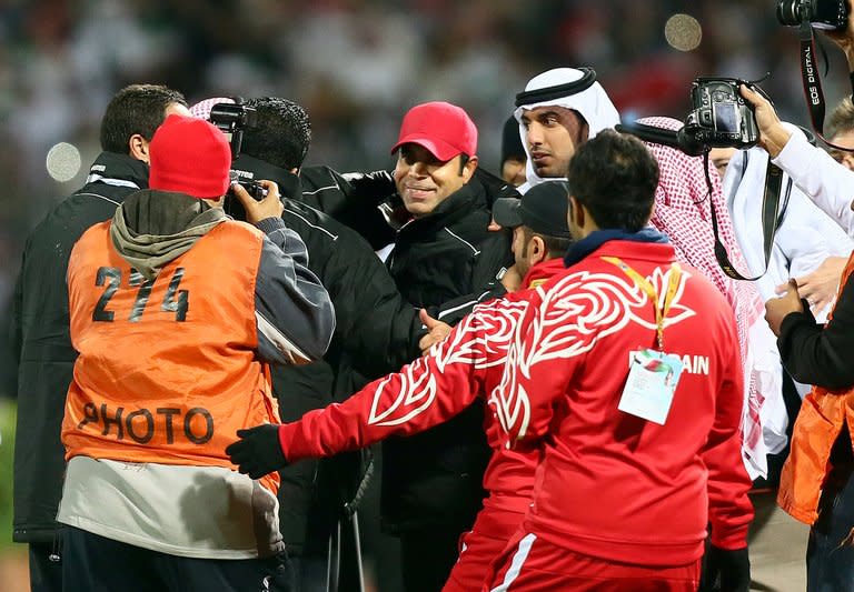 Mahdi Ali (C), coach of the UAE team, is congratulated after his team beat Kuwait at the Gulf Cup on January 15, 2013. "Iraq are very tough opponents but our team has improved to a higher level in each match. We are ready," Ali said of Friday's clash against Iraq