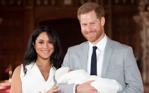 The Duke and Duchess of Sussex with their baby son - Credit: Dominic Lipinski/PA