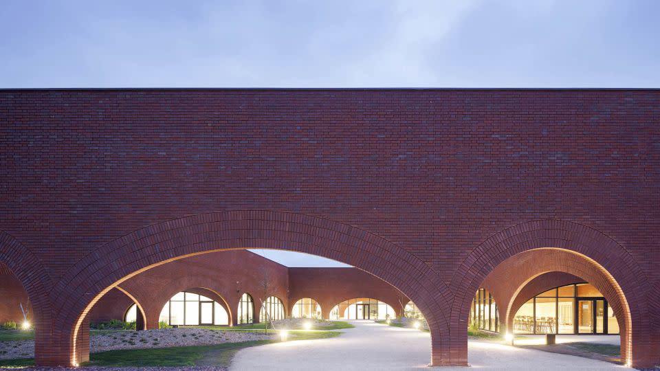 Lebanese architect Lina Gotmeh envisioned an impressive feat of brickwork for Hermès new workshop. - Iwan Baan/Architectural Digest
