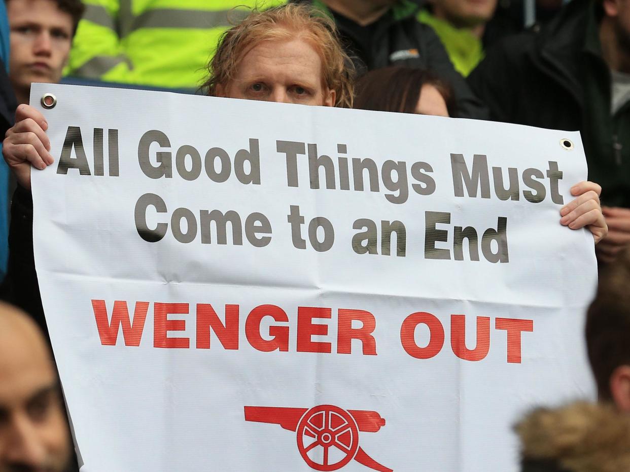 Arsene Wenger is facing increased calls to walk away this summer: Getty