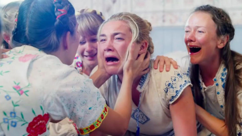 A photo of actors in the film Midsommar.