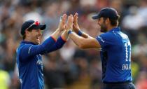 Britain Cricket - England v Pakistan - Fourth One Day International - Headingley - 1/9/16 England's Liam Plunkett celebrates with Eoin Morgan after taking a catch to dismiss Pakistan's Sarfraz Ahmed Action Images via Reuters / Lee Smith Livepic