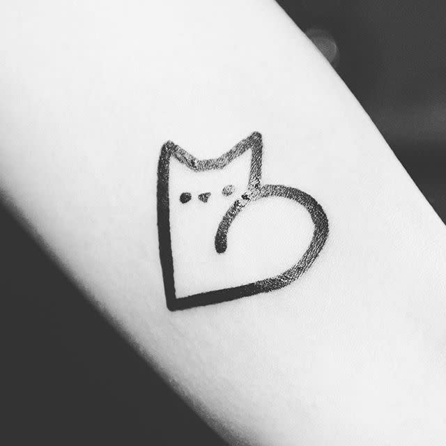 cute cat outline tattoo