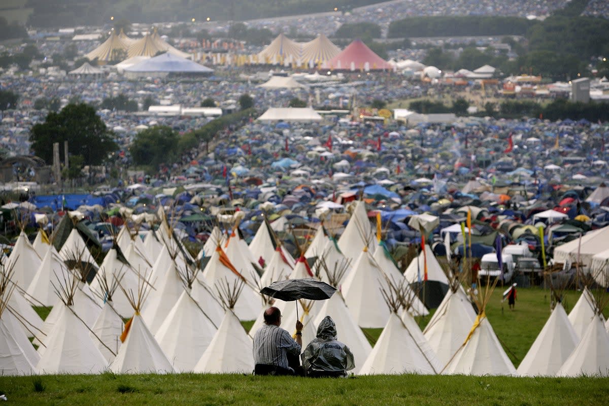 Glastonbury festival-goers ‘may need to take shelter’ from blustery thunderstorms (Yui Mok/PA) (PA Archive)