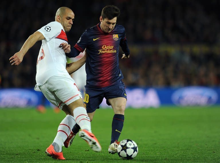 Barcelona's Lionel Messi (R) and PSG's Alex Costa are pictured during their Champions League match on April 10, 2013. "Messi was the catalyst. We changed after he came on and we have to thank him for that," teammate Pedro Rodriguez said