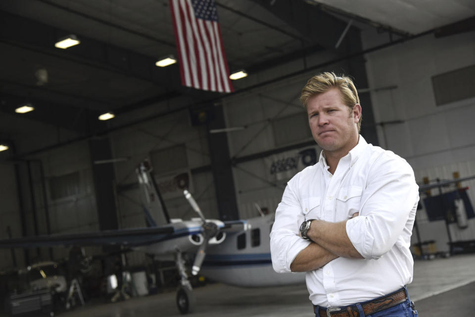 FILE - Tim Sheehy, founder of Bridger Aerospace and Ascent Vision, pauses during a tour of the company's facility, Aug. 30, 2022, in Belgrade, Mont. Montana Republican U.S. Rep. Matt Rosendale plans to run for U.S. Senate, upending a race in which many national GOP officials already coalesced around a different candidate as they seek to unseat three-term Democrat U.S. Sen. Jon Tester. The move sets up a bitter June 4, 2024, primary battle between the firebrand conservative Rosendale and former Navy SEAL Sheehy, whose backers include Montana U.S. Sen. Steve Daines, chair of the National Republican Senatorial Committee, and other prominent Senate Republicans. (Rachel Leathe/Bozeman Daily Chronicle via AP, File)