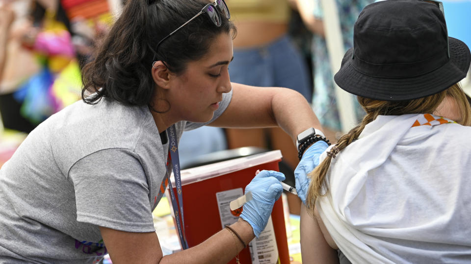 A person gets the COVID-19 vaccine at the 2021 NYC Pride Fest near Union Square on June 27, 2021 in New York City. This year's NYC Pride March theme is 'The Fight Continues.’ (Alexi Rosenfeld/Getty Images)