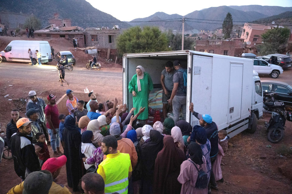Aid is distributed to displaced people in Ouirgane, Morocco (Carl Court / Getty Images)