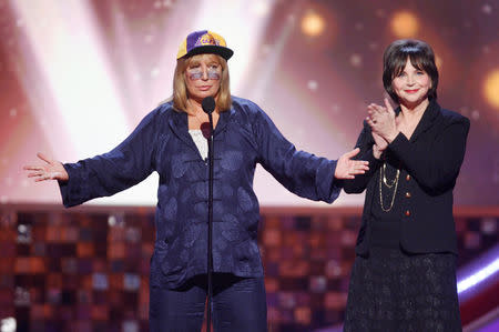 FILE PHOTO: Actresses Penny Marshall (L) and Cindy Williams, star of the TV series "Laverne & Shirley" speak about writer, director and producer Garry Marshall who received the Legend Award at the taping of the 6th annual TV Land Awards in Santa Monica June 8, 2008. REUTERS/Fred Prouser/File Photo