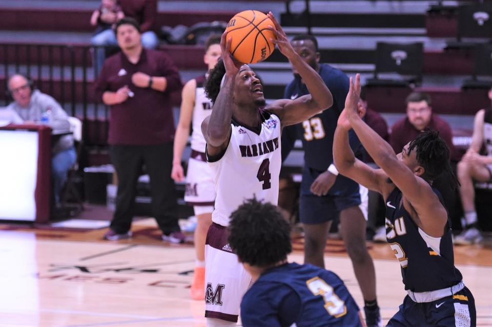 McMurry's Devon Webb (4) goes up for the go-ahead shot with 1:04 left in Saturday's American Southwest Conference game against East Texas Baptist. But the War Hawks wouldn't score again in the 78-76 loss.