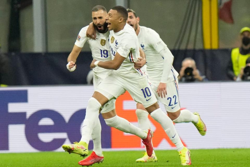 France goalscorers Benzema, left, and Mbappe celebrate (AP)