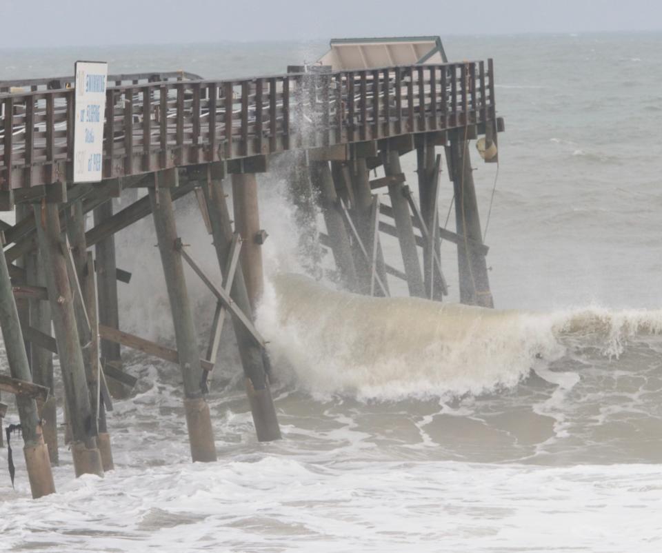 Waves pound the Flagler Beach Pier on Wednesday, as the outer bands of Hurricane Idalia moved across Volusia and Flagler counties. The remnants of the storm, among six systems out in the Atlantic, will create a risk for dangerous rip currents over the Labor Day holiday weekend in Volusia and Flagler counties, according to the National Weather Service in Melbourne.