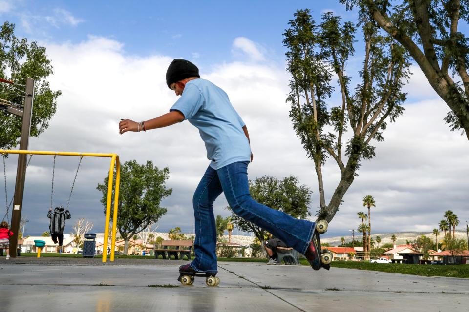 Jubilee Gomez, 12, of Cathedral City roller skates at Panorama Park in Cathedral City, Calif., on Sunday morning, February 4, 2024. Forecast predict rainfall for the coming days.