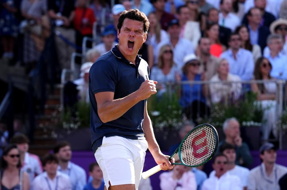 Milos Raonic celebrates victory over Cameron Norrie (Zac Goodwin/PA Wire)