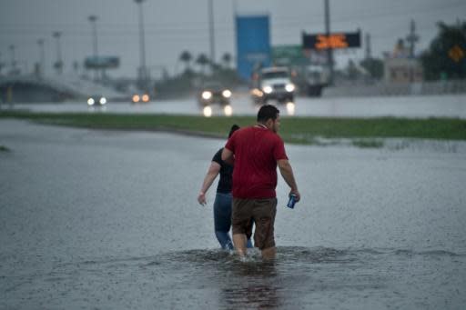 Houston battles massive floods, Trump set for Tuesday Texas trip