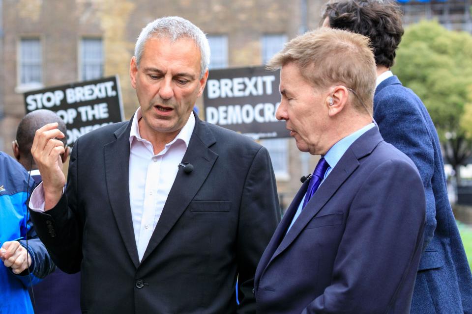 Kevin Maguire, Daily Mirror journalist and Andrew Pierce, Daily Mail Journalist, chat in Westminster, London, UK
