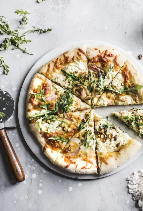 <p>The Almond Eater</p><p>This pistachio white pizza is made with plenty of burrata cheese and topped with red onions, arugula and pistachios for a salty kick.</p><p><strong>Get the recipe: <a href="https://thealmondeater.com/burrata-pistachio-white-pizza/" rel="nofollow noopener" target="_blank" data-ylk="slk:Burrata Pistachio White Pizza;elm:context_link;itc:0;sec:content-canvas" class="link rapid-noclick-resp">Burrata Pistachio White Pizza</a></strong></p>