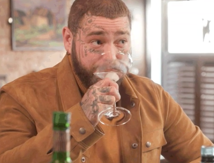 Post Malone drinking